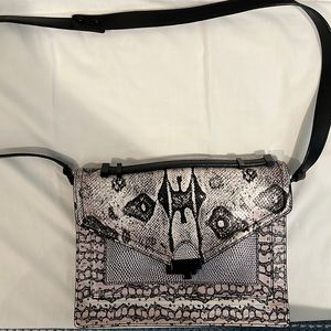 Black and white snakeskin Loeffler Randall handbag.